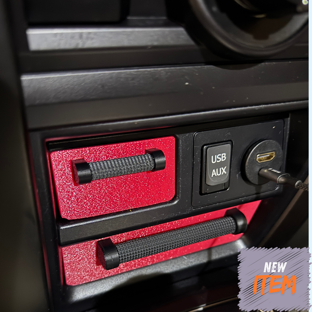 Car dashboard drawers with in red with black handles