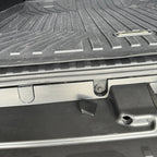 Bumper Bolt cover and bolt that it covers. Image shows the difference between a covered bolt and an exposed one