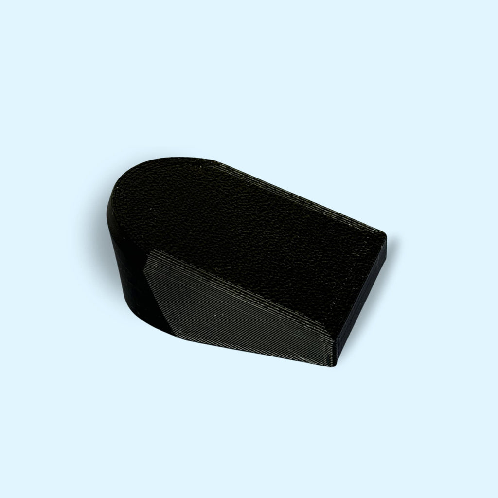 Close up of a single bolt cover. Shows the high quality of the cover.
