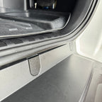 Close up of a bolt cover installed from the side view. Notice the cover fits flush to the bumper.