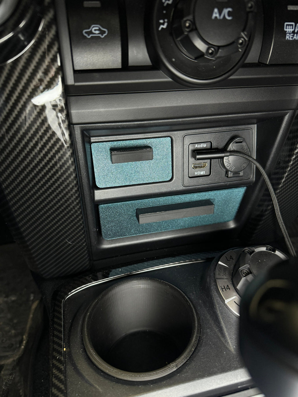 The image shows the burnt titanium faceplates on the drawers with blac2k handles. Shows both the upper and lower drawers.